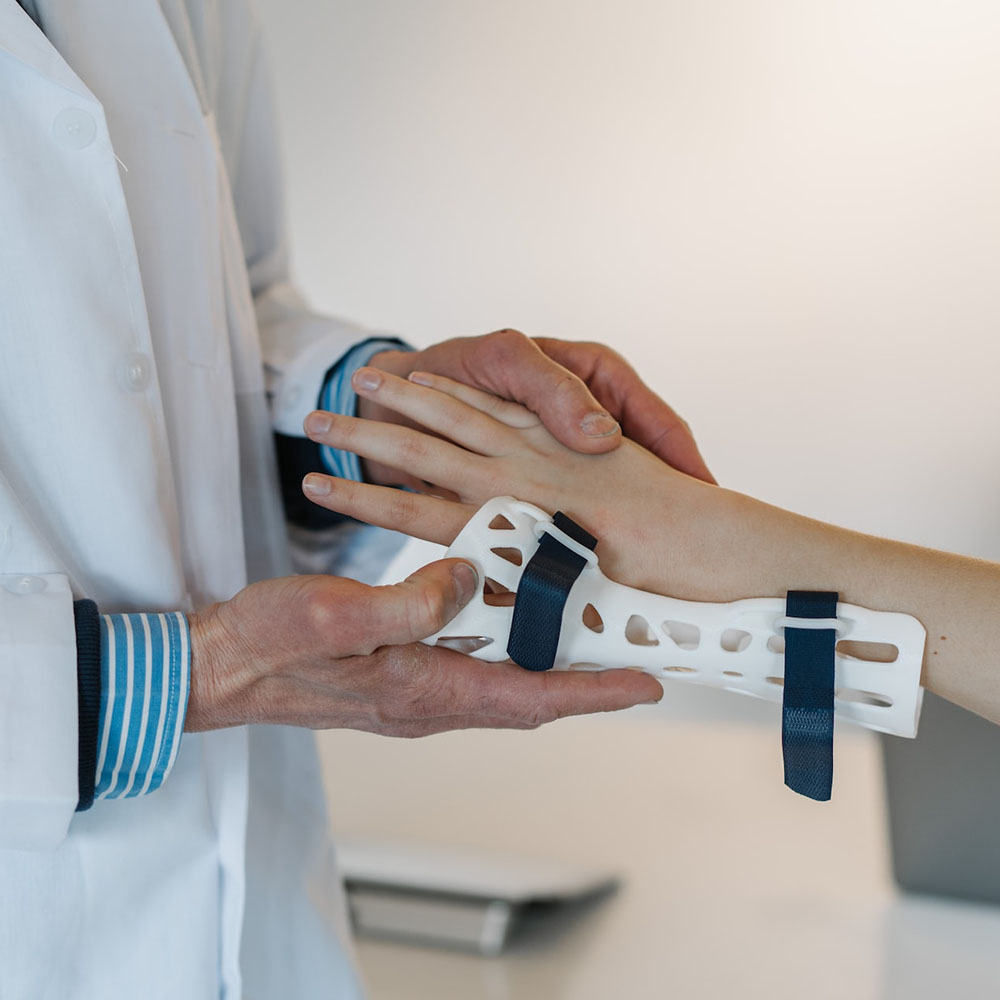 A patient receiving a wrist splint from their Certified Hand Therapist in Scarborough, Maine.